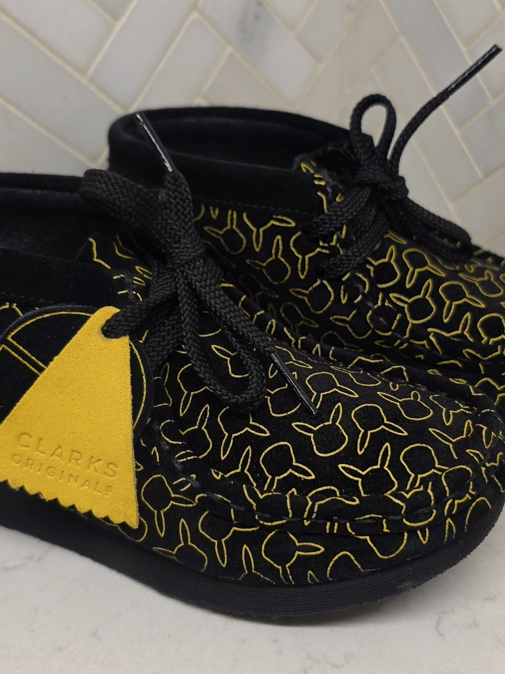 Clarks Kids Black Suede Moccasins with Yellow Embroidery